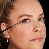 E06 WINGED LINER™ BRUSH WITH MODEL